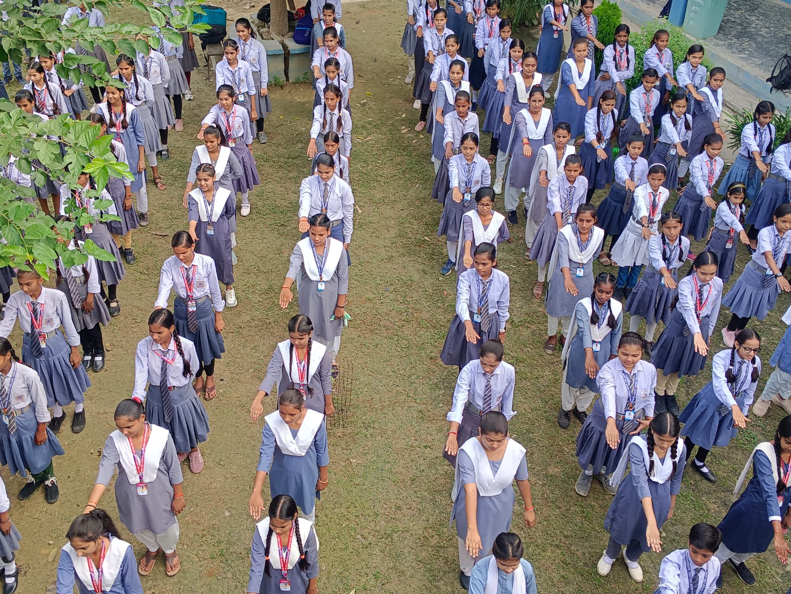 Students lined up in school uniform during assembly at Gurukripa